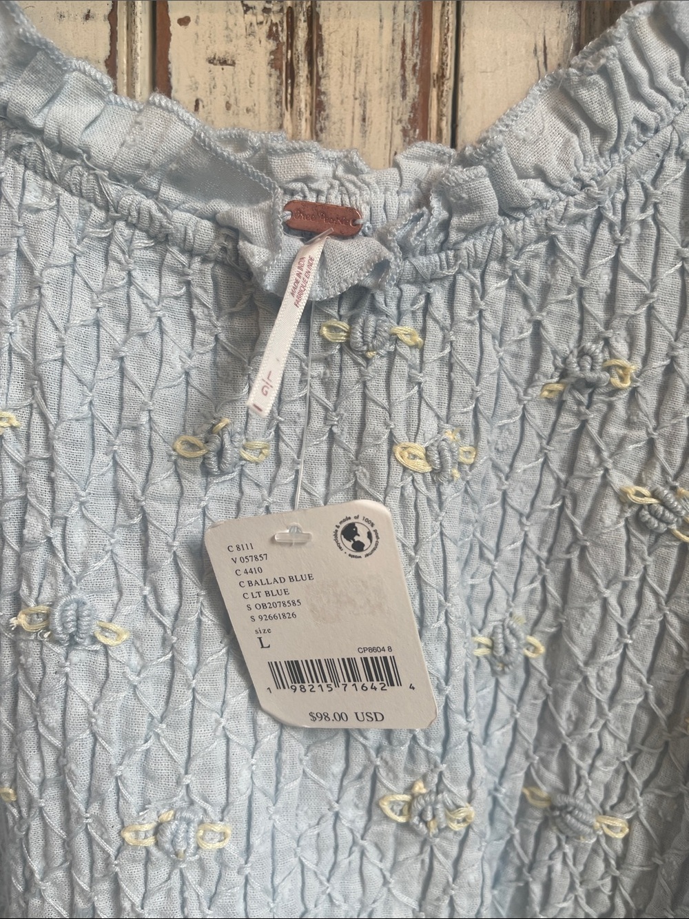 Light Blue Smocked Puff Sleeve Top with Floral Details - Picture 8 of 11